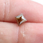 0.39 Ct kite cut brown grey natural diamond with sharp angles and modern luxury appeal