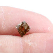 0.39 Ct kite cut brown grey natural diamond with sharp angles and modern luxury appeal