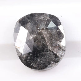 Natural black diamond ring featuring deep rich color and modern setting. Earth-mined fancy color diamond ideal for unique engagement or fashion ring.