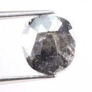 Natural black diamond ring featuring deep rich color and modern setting. Earth-mined fancy color diamond ideal for unique engagement or fashion ring.