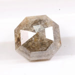 Raw natural diamond in rock showing uncut crystal formation as found in nature. Authentic earth-mined rough diamond before polishing and cutting.