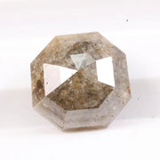 Raw natural diamond in rock showing uncut crystal formation as found in nature. Authentic earth-mined rough diamond before polishing and cutting.
