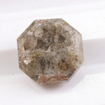 Raw natural diamond in rock showing uncut crystal formation as found in nature. Authentic earth-mined rough diamond before polishing and cutting.