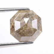 Raw natural diamond in rock showing uncut crystal formation as found in nature. Authentic earth-mined rough diamond before polishing and cutting.