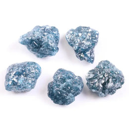 Rare deep blue diamond set in a custom ring, highlighting brilliance and luxury.