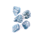 Rare deep blue diamond set in a custom ring, highlighting brilliance and luxury.