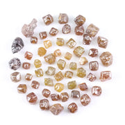 Fancy multi color raw natural diamond lot featuring yellow, brown and golden rough uncut stones