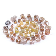 Fancy multi color raw natural diamond lot featuring yellow, brown and golden rough uncut stones