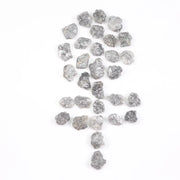 Raw gray silver diamond with shimmering steel-toned surface for custom jewelry