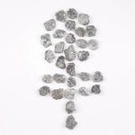 Raw gray silver diamond with shimmering steel-toned surface for custom jewelry