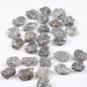 Raw gray silver diamond with shimmering steel-toned surface for custom jewelry
