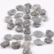 Raw gray silver diamond with shimmering steel-toned surface for custom jewelry
