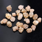 rough diamond , uncut rough diamond, orange raw diamond in matrix and kimberlite, brown diamond 