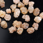rough diamond , uncut rough diamond, orange raw diamond in matrix and kimberlite, brown diamond 