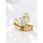Vintage inspired Kira Kirby style engagement ring set with an oval champagne lab-grown diamond in 14k yellow gold