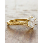 Antique gold wedding rings with romantic vintage inspired detailing