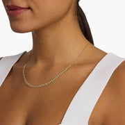 3.67 Ct Gold bow necklace pendant with ribbon-inspired design.