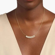 4.38 Ct Long gold necklace with layered chain design.