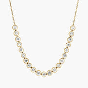 0.49 Ct gold pendant necklace with delicate chain and charm.