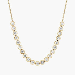 0.49 Ct gold pendant necklace with delicate chain and charm.