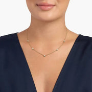 1.36 Ct Womens gold necklace with delicate chain and pendant.