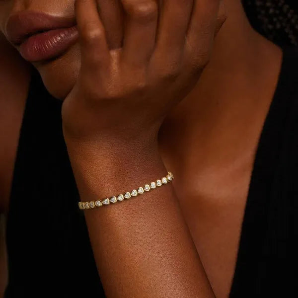 Heart Shaped Lab Diamond Bezel Tennis Bracelet in 14k Yellow Gold Plated