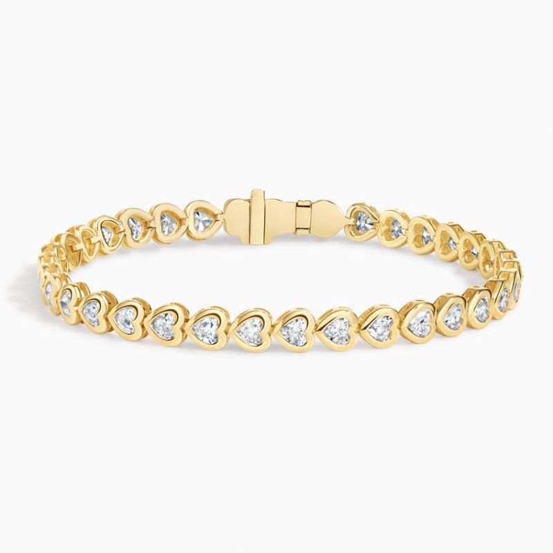 Heart Shaped Lab Diamond Bezel Tennis Bracelet in 14k Yellow Gold Plated