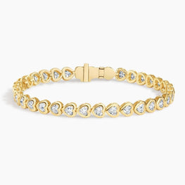 Heart Shaped Lab Diamond Bezel Tennis Bracelet in 14k Yellow Gold Plated
