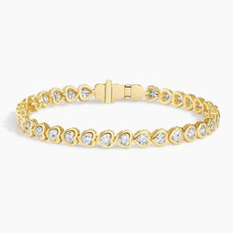 Heart Shaped Lab Diamond Bezel Tennis Bracelet in 14k Yellow Gold Plated
