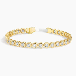 Heart Shaped Lab Diamond Bezel Tennis Bracelet in 14k Yellow Gold Plated