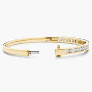 Diamond bracelet for women with round diamonds in white gold setting.