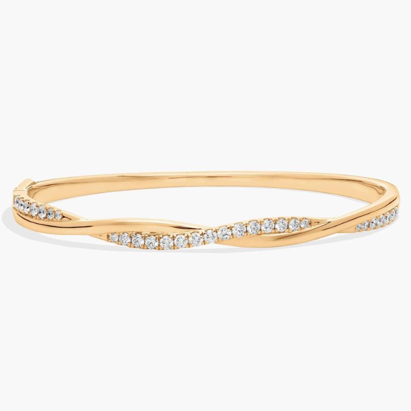 Twisting Moissanite Diamond Bangle In 14k Yellow Gold Plated