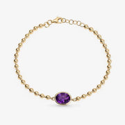 Diamond tennis bracelet for women in gold with round diamonds.