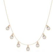 4.98 Ct Gold snake necklace with flexible chain and shiny texture.