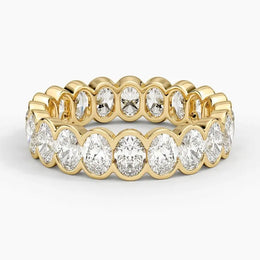 Oval Cut Lab Grown Diamond Eternity Ring (3.12 ct. tw.) in 14K Yellow Gold Semi-Bezel Wedding Band Ring