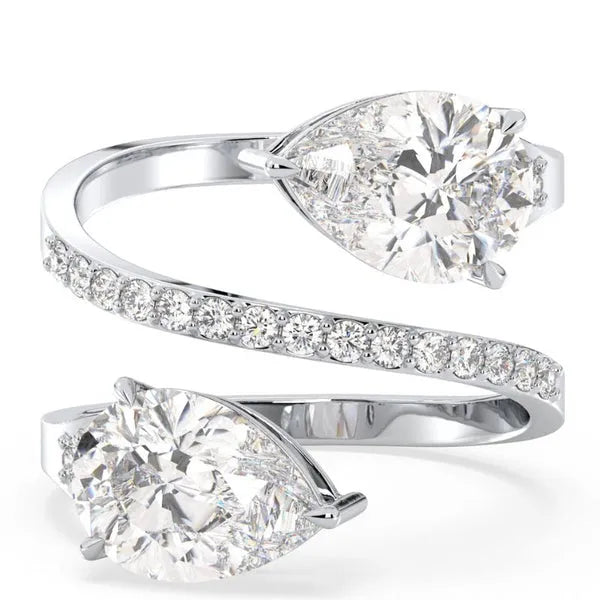 Whispering Pear & Round Moissanite Solitaire Ring