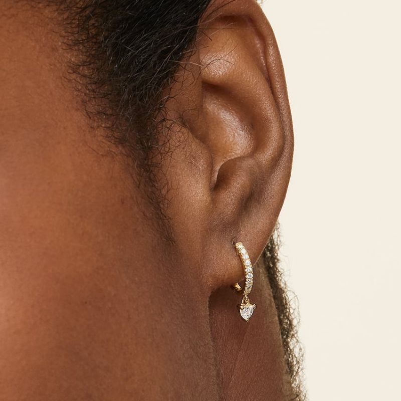 Heart Shape Moissanite Diamond Huggie Earrings in 14k Yellow Gold Plated
