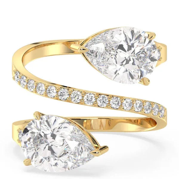 Whispering Pear & Round Moissanite Solitaire Ring