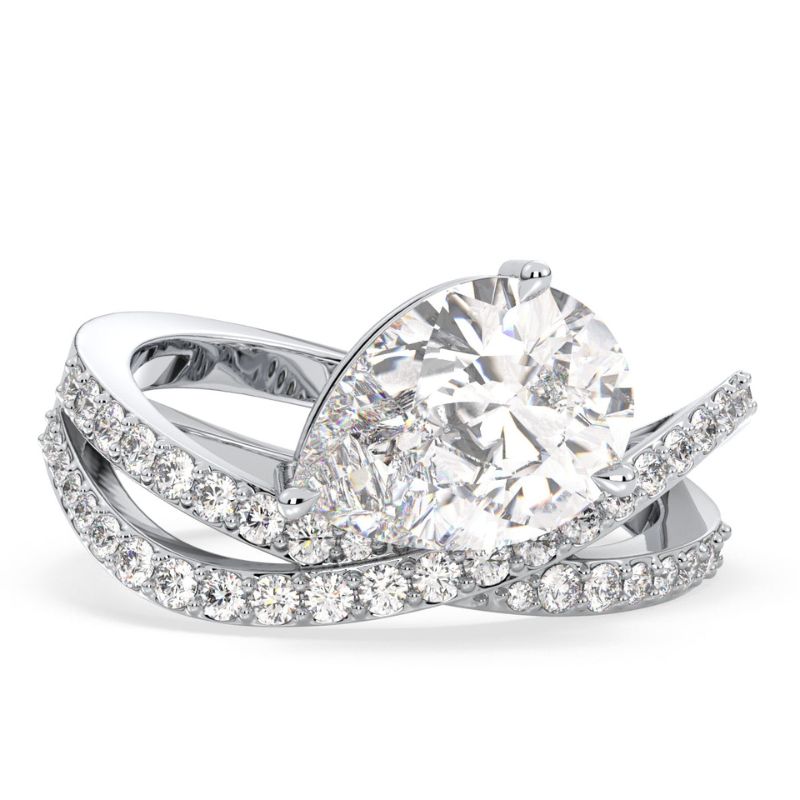 Pure Brilliance Pear & Round Moissanite Unique Ring