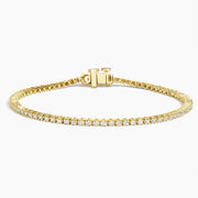 3.21 Ct Round Cut Gold Plated Diamond tennis bracelet with blue stones and diamond accents.