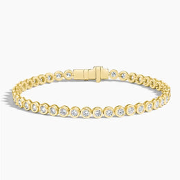 3.89 Ct Tennis bracelet diamond jewelry with sparkling white diamonds in gold setting.