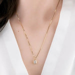 mens gold pendant with bold gold pendant for men styling and polished luxury pendant finish.