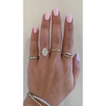 hailey Bieber engagement ring inspired marquise diamond engagement ring with luxury modern bridal style.