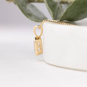 mens gold pendant with bold gold pendant for men styling and polished luxury pendant finish.