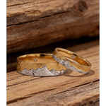 Modern couple rings with sleek band and diamond accents for stylish pairs.