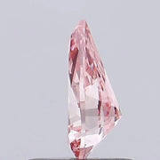 vivid pink colour pear cut pink lab grown diamond with brilliant facets on a light gray background.