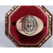 Elegant lab created gemstone ring with garnet red stone and sparkling diamond setting