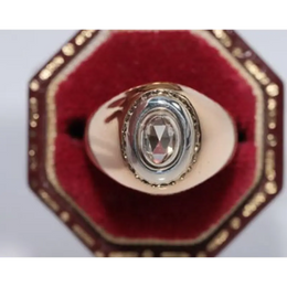 Elegant lab created gemstone ring with garnet red stone and sparkling diamond setting