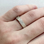 Infinity design couple rings symbolizing eternal love, crafted in sterling silver.
