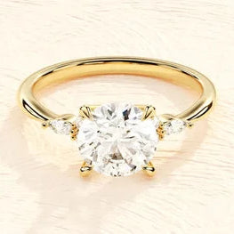 Oval Cut Three Stone Delicate Ring